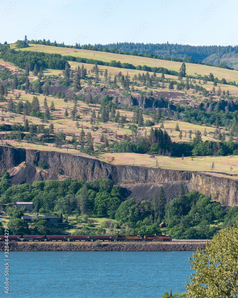 A Train Travels Along the Columbia River Gorge