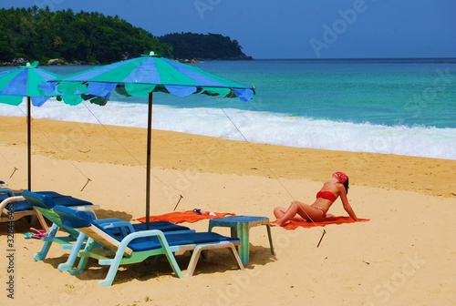 Sunbathing is a way to rest of foreign tourist. More tourists visit to Karon Beach for Sunbath in the morning until afternoon.