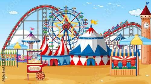 Scene with circus rides on the beach at day time