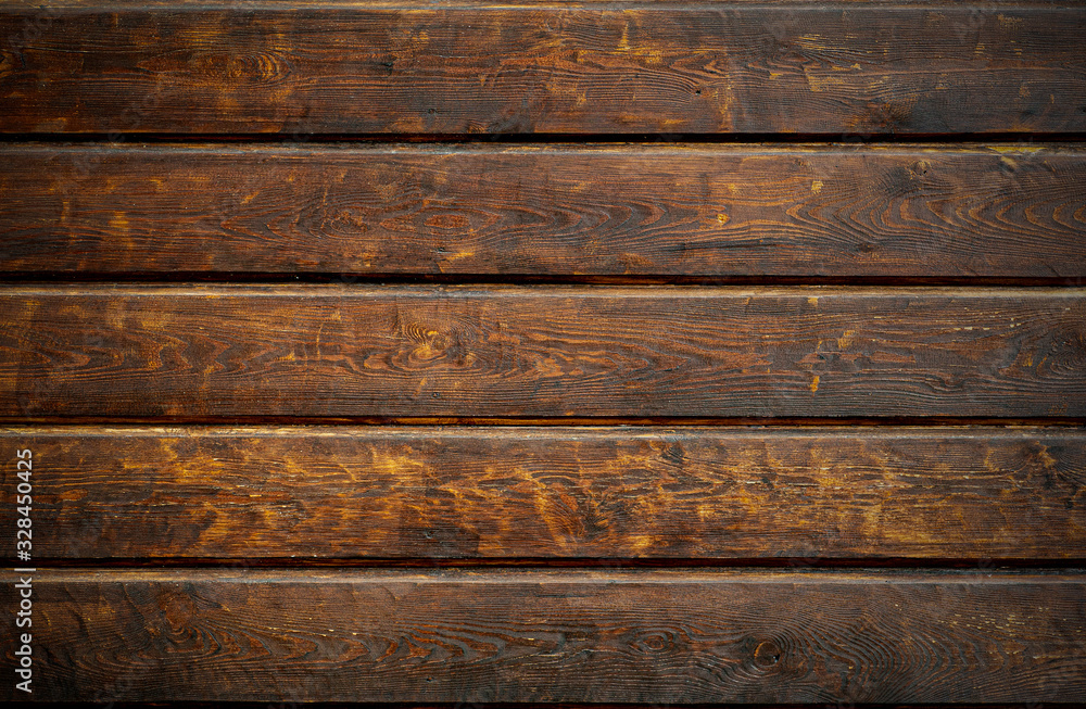 Fototapeta premium Old wooden background in rustic style. Dark wooden background with the structure and pattern of boards and panels. Copy space