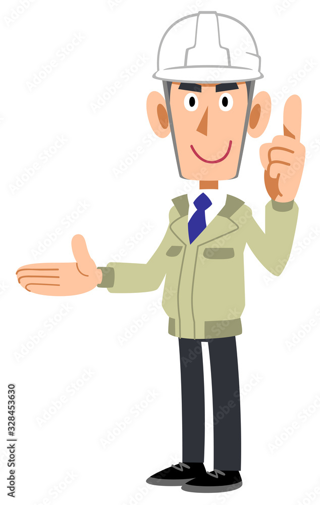 人差し指を立てて右側を紹介する工務店の男性