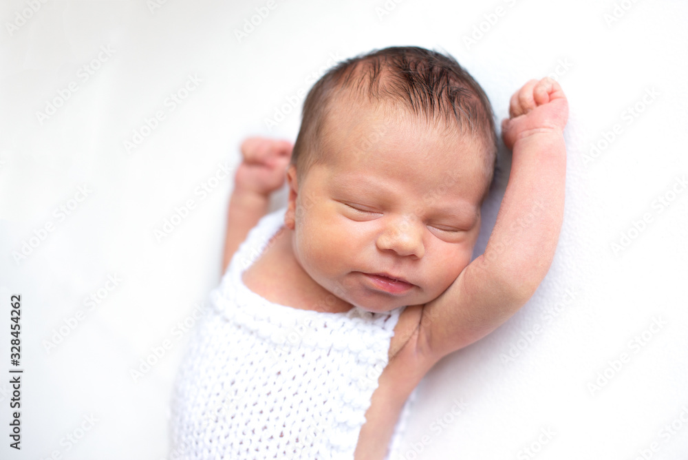 Newborn baby emotions, white background. Funny face of a child, emotions. Newborn baby emotions, white background. Funny face of a child, emotions.