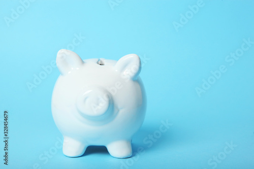 piggy piggy bank on a colored background. The concept of saving money.