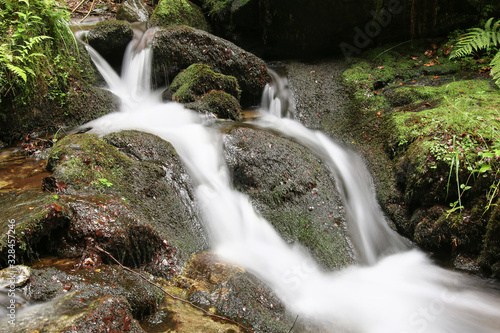Fototapeta Naklejka Na Ścianę i Meble -  Water flowing over rocks