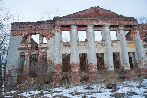 LENINGRAD REGION, RUSSIA - MARCH 9, 2014: view of the destroyed old buildings on the territory of the Blumentrostov and von Gersdorff estate in Kummolovo photo