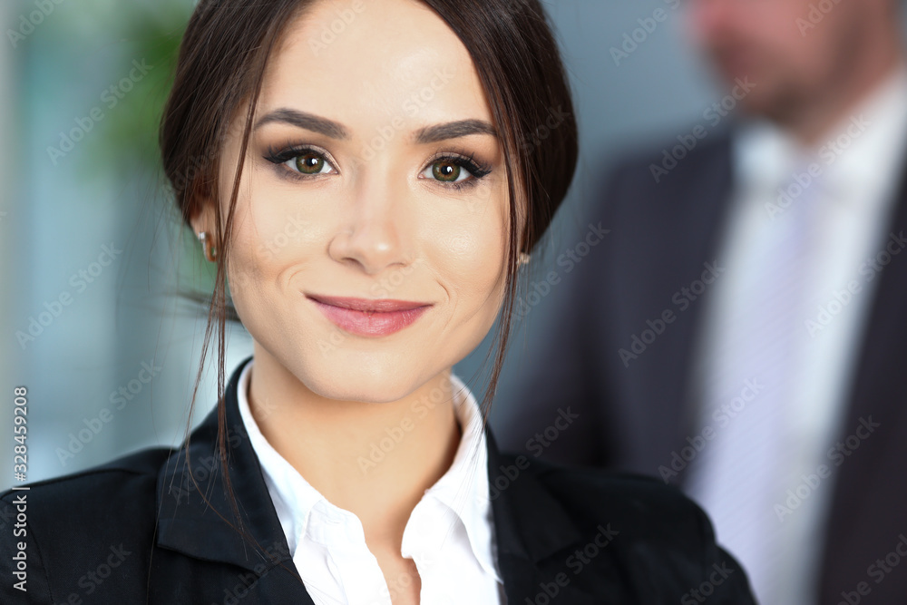 Beautiful smiling clerk girl wearing suit hold notebook at workplace look in camera portrait. White collar worker at modern training coach visit boss job offer client profession market idea study Beautiful smiling clerk girl wearing suit hold notebook at workplace look in camera portrait. White collar worker at modern training coach visit boss job offer client profession market idea study