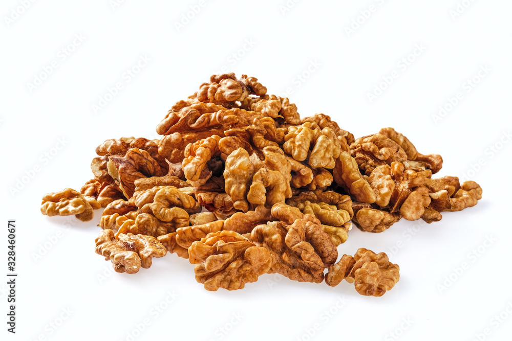 Heap of peeled wallnuts isolated on white Heap of peeled wallnuts isolated on white