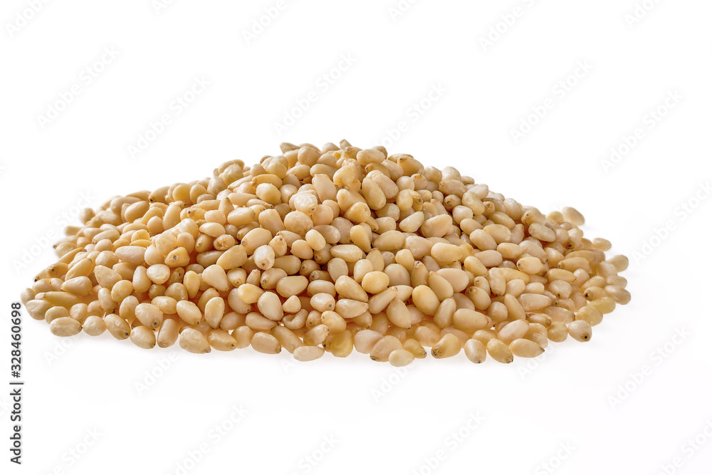 Heap of pine nuts isolated on white Heap of pine nuts isolated on white