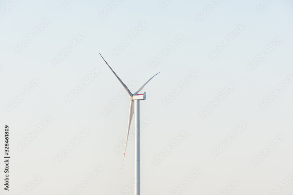 The windmill of electric power production, green energy application, Chinese economy development. The windmill of electric power production, green energy application, Chinese economy development.
