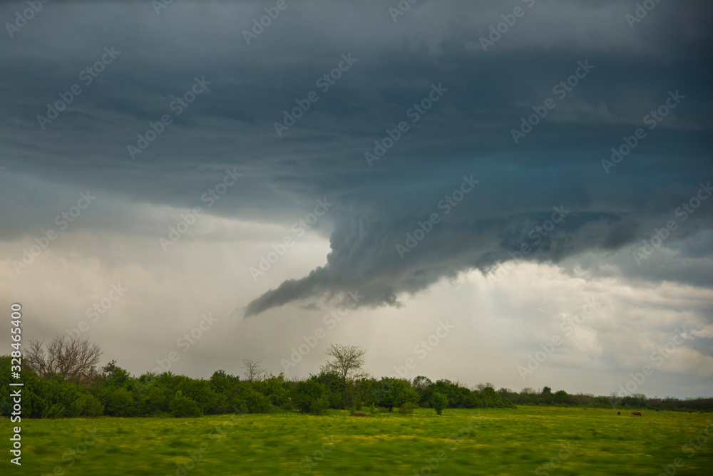 Spring landscape with a stormy sky Spring landscape with a stormy sky
