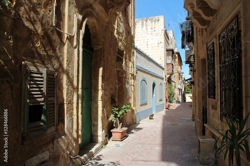 street and houses in bormla in malta photo