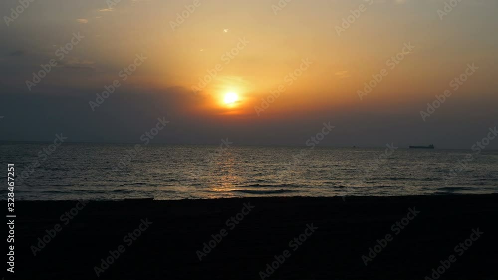 beautiful sunset on the sea with boat silhouettes on the horizon beautiful sunset on the sea with boat silhouettes on the horizon