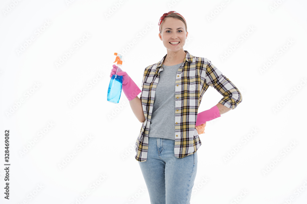 Portrait of happy female doing house duties wearing rubber gloves and holding cleaning equipment. Cheerful look. Hygiene, cleaning service concept. Isolated picture. White background. Portrait of happy female doing house duties wearing rubber gloves and holding cleaning equipment. Cheerful look. Hygiene, cleaning service concept. Isolated picture. White background.