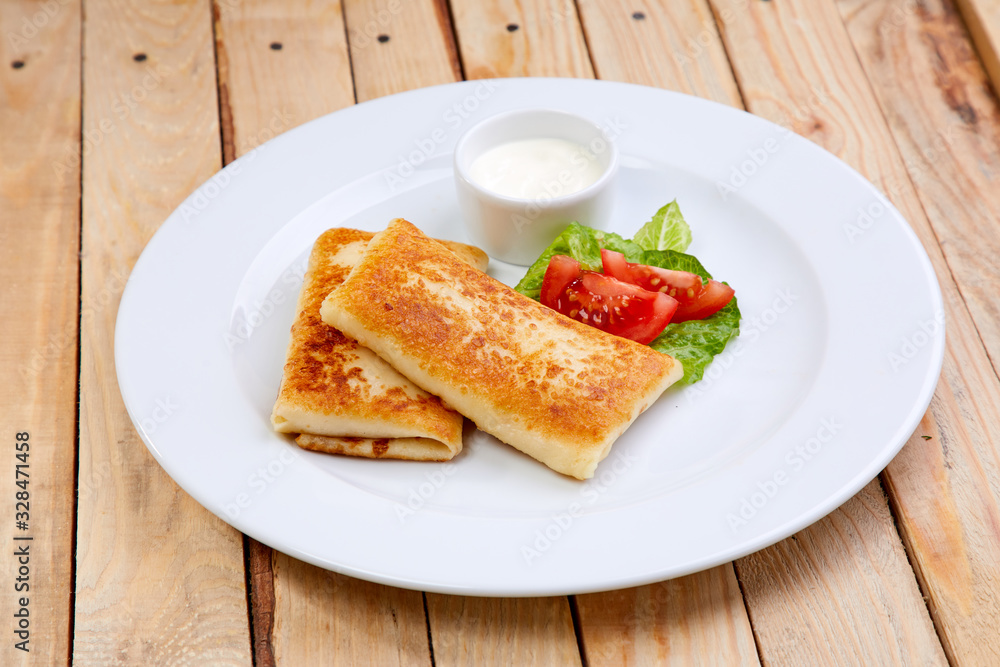 stuffed pancakes with sour cream stuffed pancakes with sour cream