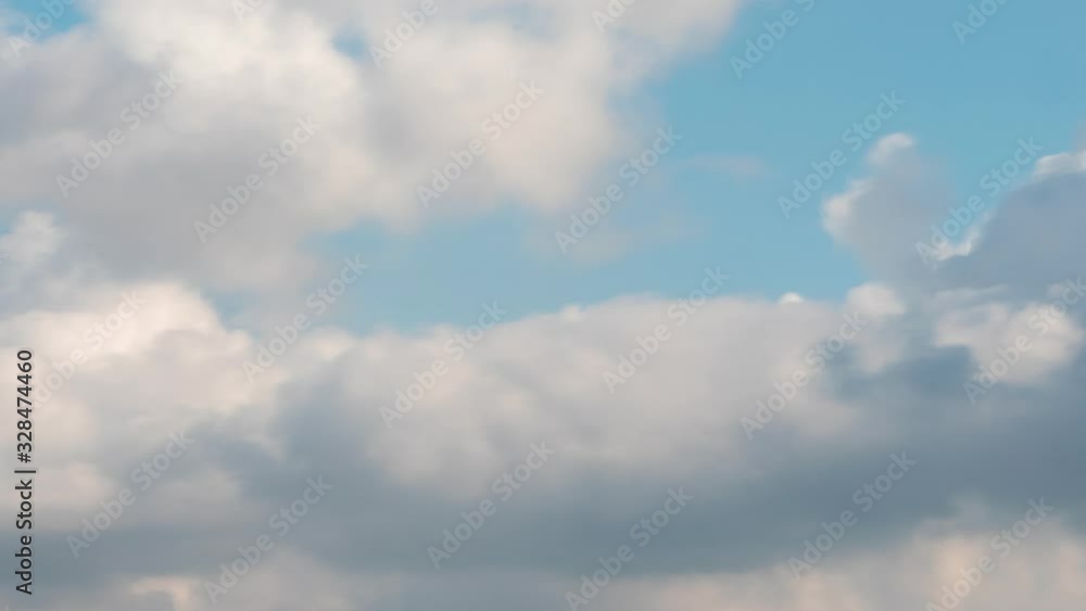 the movement of dark clouds in the blue sky the movement of dark clouds in the blue sky