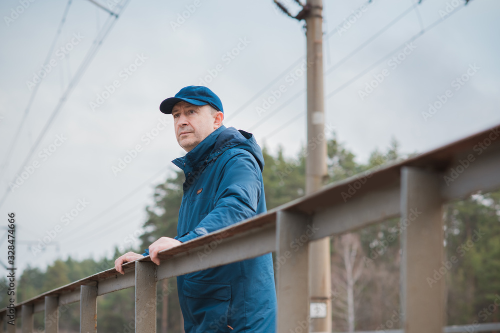 Crisis of middle age. Mature European man with a sad philosophical mood. The concept of life after 50 years, problems and depression. Crisis of middle age. Mature European man with a sad philosophical mood. The concept of life after 50 years, problems and depression.