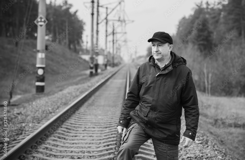 Crisis of middle age. Mature European man with a sad philosophical mood. The concept of life after 50 years, problems and depression. Crisis of middle age. Mature European man with a sad philosophical mood. The concept of life after 50 years, problems and depression.