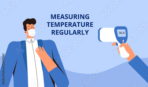 Young man in a protective medical mask measures the temperature with a remote thermometer. Poster asking you to check your temperature regularly. Corvirus control concept COVID-2019