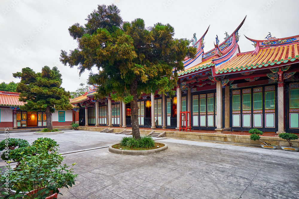 Fototapeta premium Tree in the back yard of Confucius Temple in Taipei