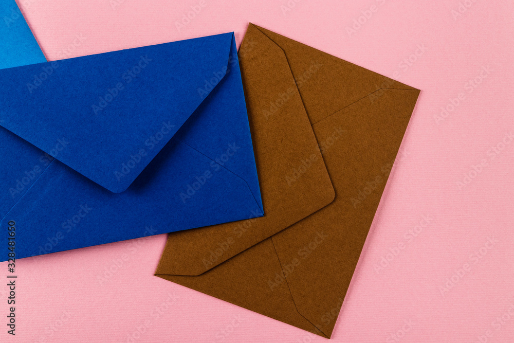 Colorful envelopes on a pink background. Colorful envelopes on a pink background.