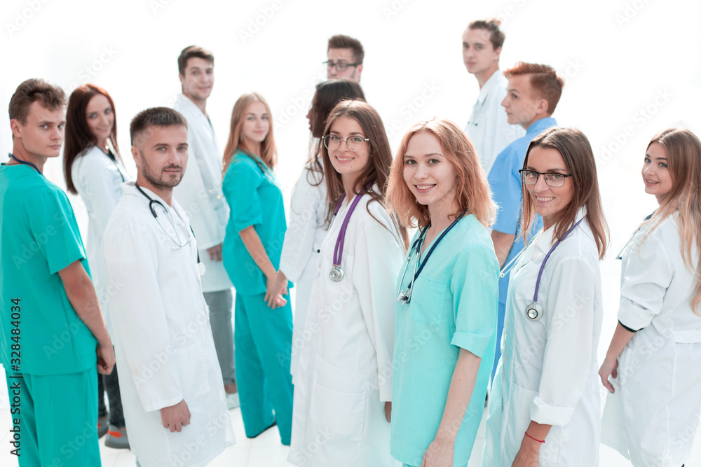 top view. a group of smiling doctors pointing at you. top view. a group of smiling doctors pointing at you.
