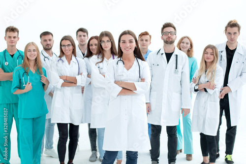 portrait of a happy group of young doctors photo