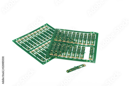 Multiplied printed circuit boards PCB isolated on the white background. PCB assembly.