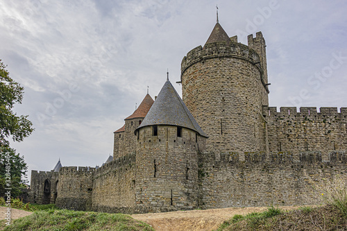 Obraz na plátne Medieval citadel at Carcassonne - huge and completely over-the-top, encompassing no less than 53 towers, enormous concentric walls, surrounded by a moat