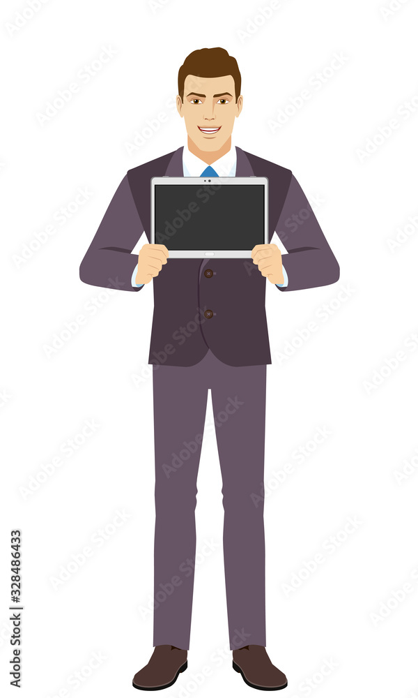 Smiling Businessman showing blank digital tablet PC. Full length portrait of Businessman in a flat style. Smiling Businessman showing blank digital tablet PC. Full length portrait of Businessman in a flat style.