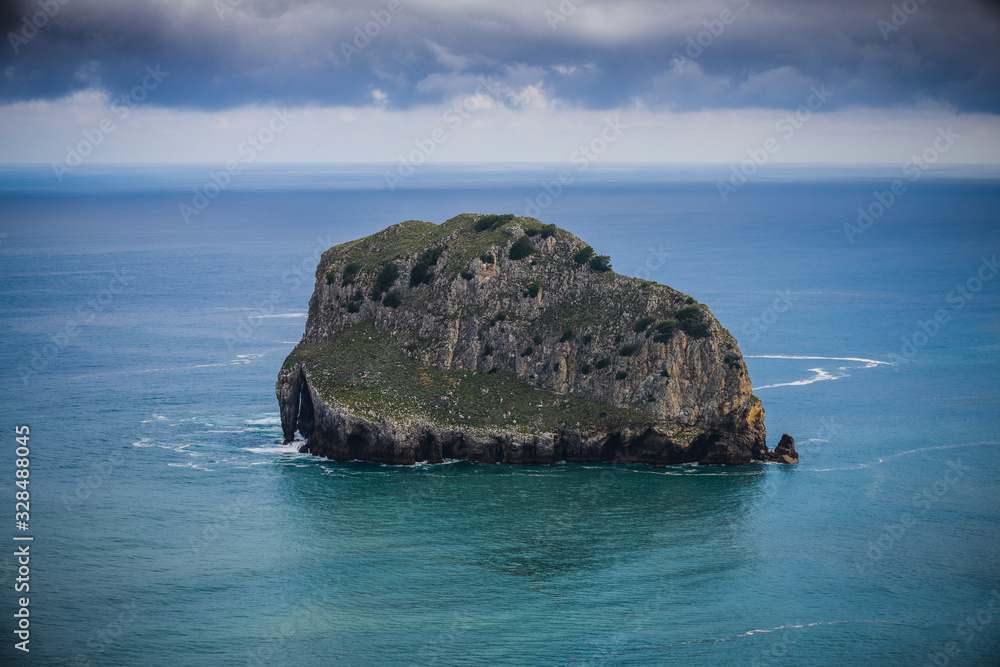 Huge cliffs near the island of Gastelugache. Basque country. Northern spain