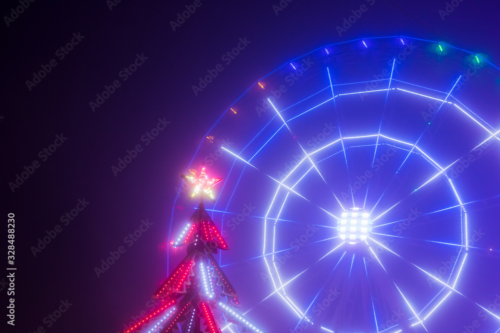 ferris wheel illuminated at night ferris wheel illuminated at night