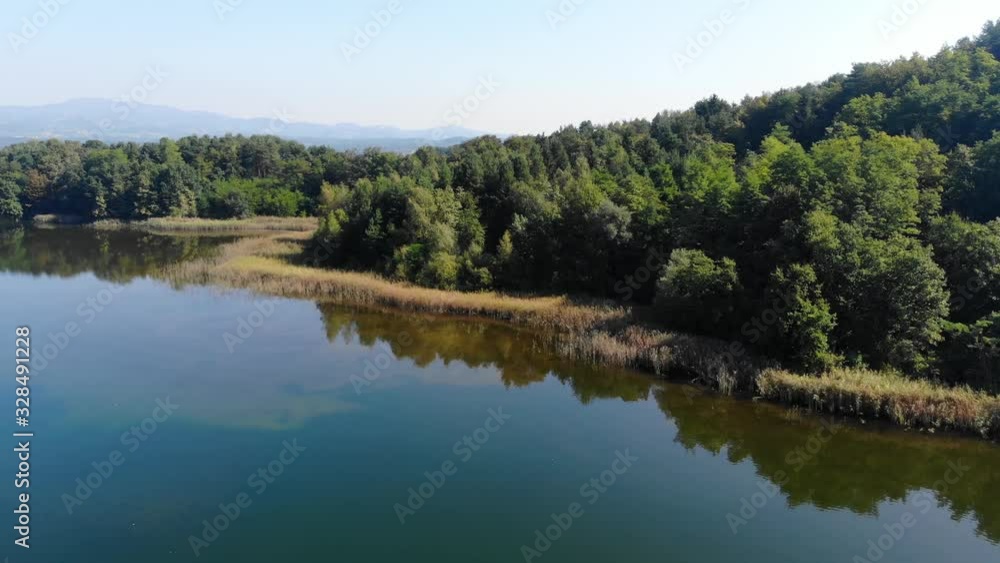An artificial lake used for Industrial liquid chemical disposal, Aerial flyover view An artificial lake used for Industrial liquid chemical disposal, Aerial flyover view