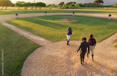 Baseball team playing in the field