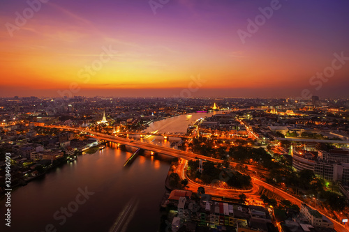 City Scape, Panorama of Chao Praya River. River view overlooking the Phra Phuttha Yodfa Bridge or Memorial Bridge and Wat Arun with grand Palace in the background, Bangkok Thailand. 26 January 2019