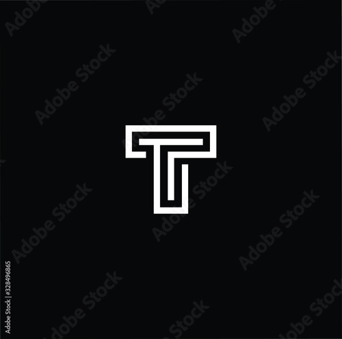 Initial based modern and minimal Logo. T TT letter trendy fonts monogram icon symbol. Universal professional elegant luxury alphabet vector design photo