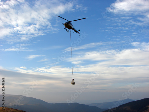 Helicopter with goods load carry