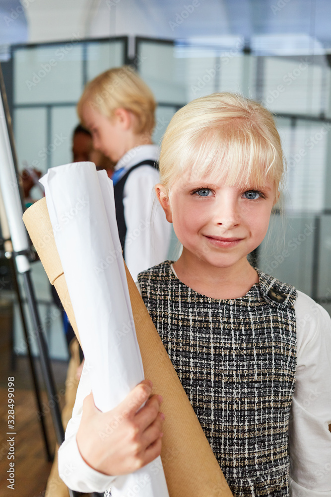 Girl with architectural drawing as an architect Stock Photo Adobe Stock