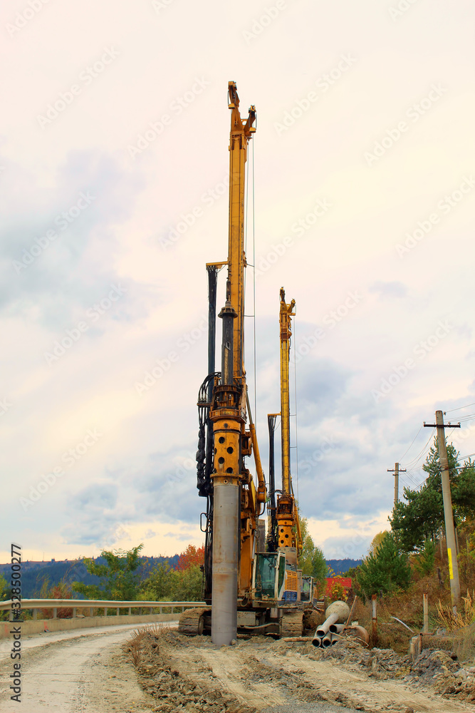 Machinery drilling on construction site Machinery drilling on construction site
