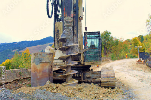 Machinery drilling on construction site