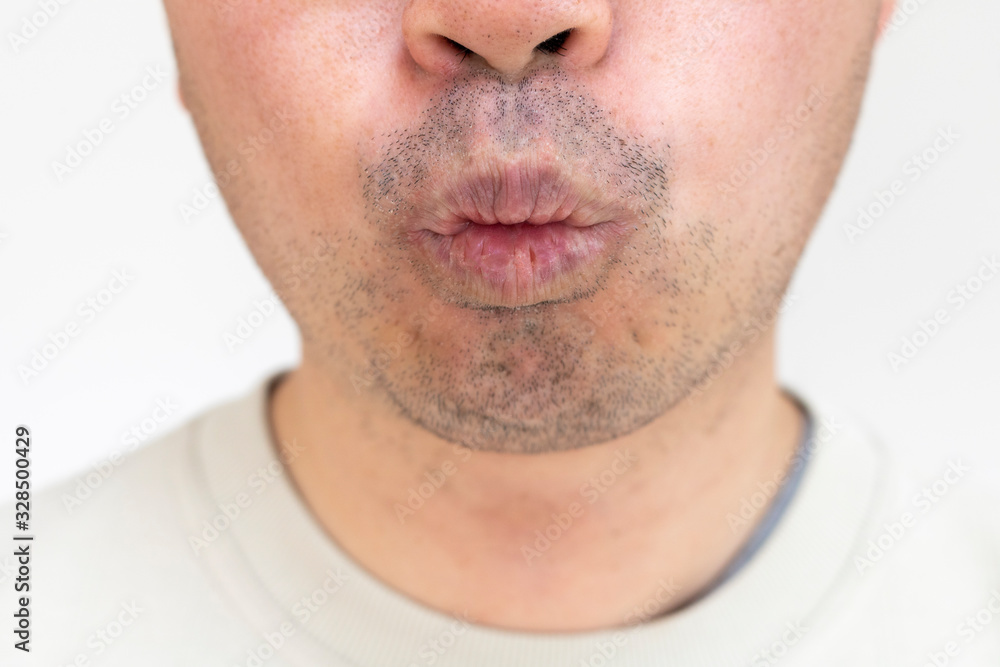 Fototapeta premium 無精ひげの男の口元
