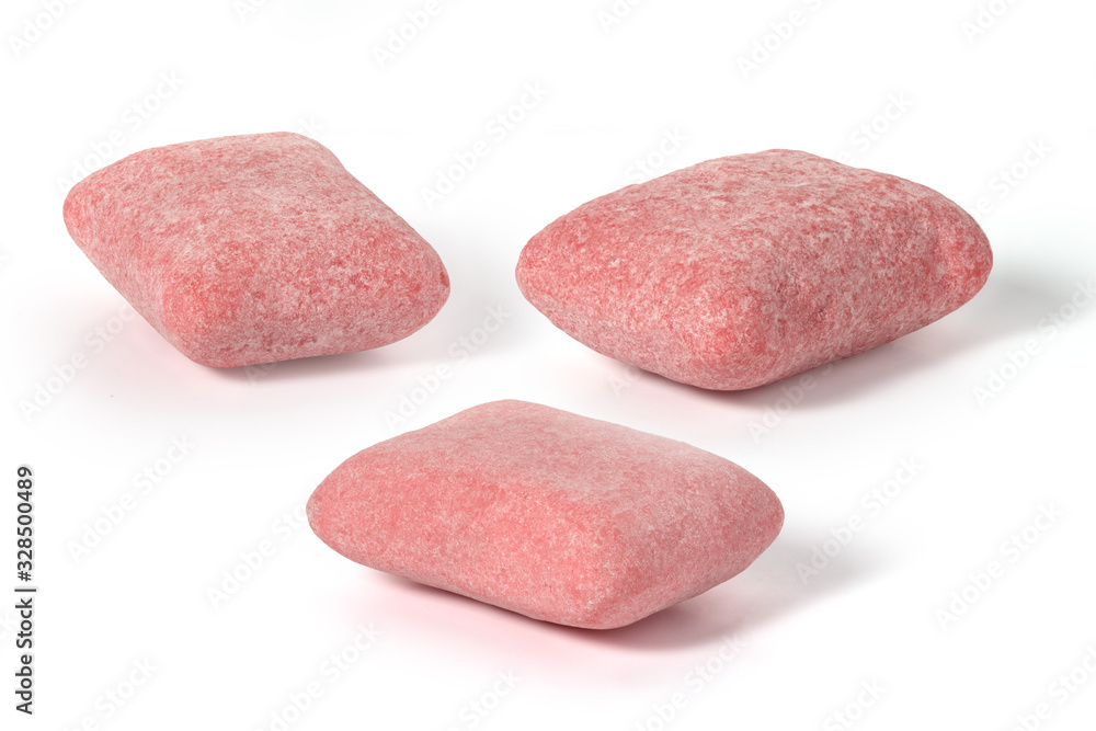 Three pads of pink strawberry chewing gum on a white background Three pads of pink strawberry chewing gum on a white background