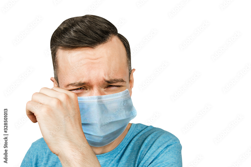 Unhappy, cry young man wearing a protective face mask prevent virus infection or pollution on white isolated background Unhappy, cry young man wearing a protective face mask prevent virus infection or pollution on white isolated background
