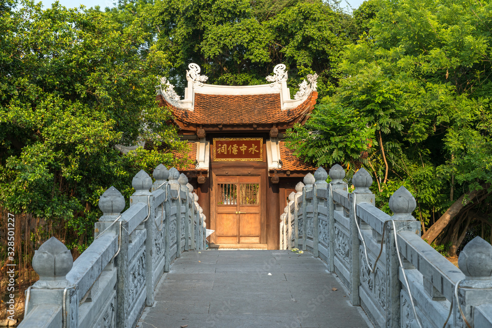 Thuy Trung Tien temple with stone bridge on Thanh Nien street in Hanoi, Vietnam Thuy Trung Tien temple with stone bridge on Thanh Nien street in Hanoi, Vietnam