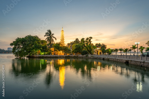 Tran Quoc pagoda, the oldest Buddhist temple in Hanoi, at twilight. The famous destination travel in Hanoi