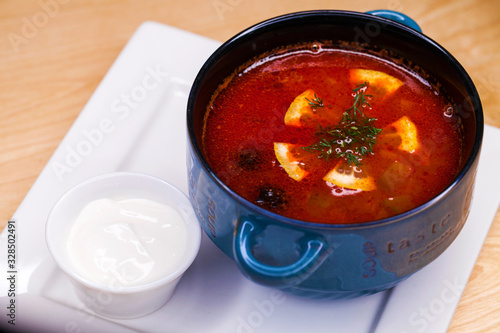 Photos restaurant dish - soup solyanka in plate