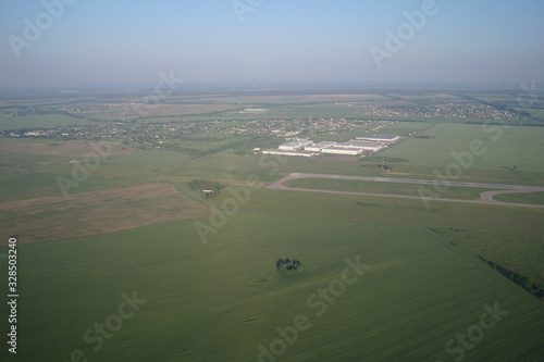 Obraz na płótnie aerial view over the agricultural plant w salonie