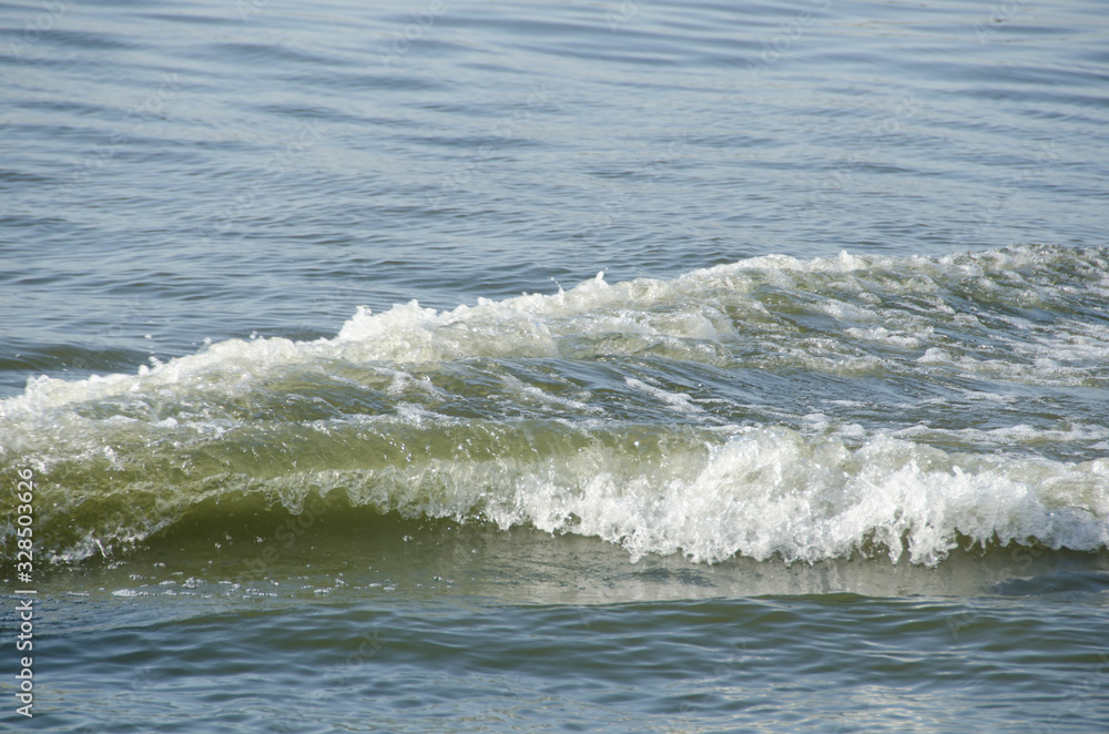 Fototapeta premium Water waves splashing in the river