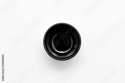 Empty Black Flower Pot Mock-up. Closeup isolated on white background. Design template for branding.High resolution photo.Top view