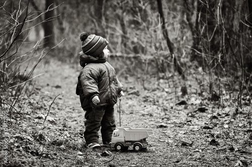 Little Boy With a Car Toy Got Lost In a Forest