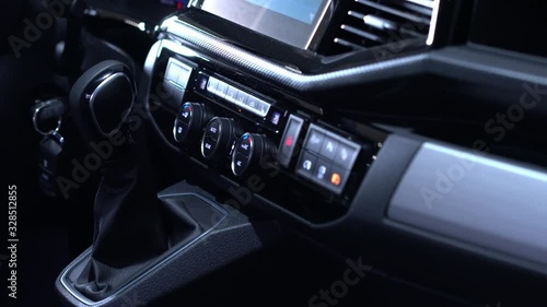 Car dashboard interior with automatic gearbox handle and air conditioner control system of the new modern van